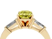 Fancy Yellow Emerald Cut Diamond Solitaire Ring Set in Yellow gold with Tapered Baguette Accents and Prong Setting