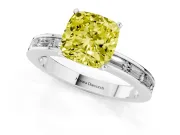 Fancy Yellow Cushion Cut Diamond Solitaire Ring Set in White gold with Channel-Set Baguette Band and Prong Setting