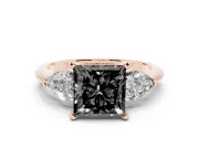 Fancy Black Three-Stone Princess Cut Diamond Ring Set in Rose gold with Pear Side Stones and Prong Setting