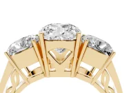 Cushion Cut Diamond Three-Stone Ring Set in Yellow gold with Textured Band