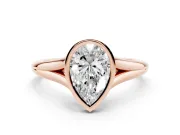 Bezel Set Pear Cut Diamond Solitaire Ring Set in Rose gold with Tapered Band