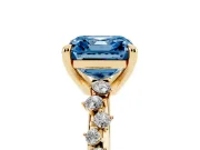 Fancy Blue Asscher Cut Diamond Solitaire Vine Band Ring Set in Yellow gold with Round Accents and Prong Setting