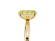 Fancy Yellow Emerald Cut Diamond Solitaire Ring Set in Yellow gold with Prong Setting on a Polished Plain Band
