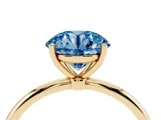 Fancy Blue Round Cut Diamond Solitaire Engagement Ring Set in Yellow gold with Thin Band and Prong Setting