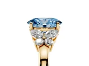 Fancy Blue Oval Cut Diamond Solitaire Floral Ring Set in Yellow gold with Marquise Petals and Prong Setting