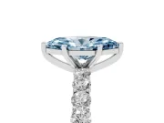 Fancy Blue Marquise Cut Diamond Solitaire Ring Set in Platinum with Shared Prong Pavé Band