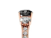 Fancy Black Cushion Cut Diamond Three-Stone Ring Set in Rose gold with Round Side Stones and Pavé Band
