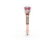 Fancy Pink Cushion Cut Diamond Three-Stone Ring Set in Rose gold with Round Side Stones and Pavé Band