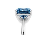 Fancy Blue Asscher Cut Diamond Solitaire Ring Set in Silver with Prong Setting on a Plain Round Band