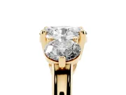 Oval Cut Diamond Three-Stone Ring Set in Yellow gold with Prong Setting and Classic Band