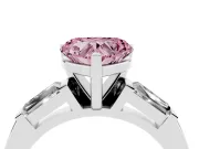 Fancy Pink Heart Cut Diamond Solitaire Ring Set in White gold with Tapered Baguette Side Stones and Prong Setting