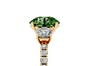 Fancy Green Round Cut Diamond Three-Stone Ring Set in Yellow gold with Pavé Band and Graduated Sides