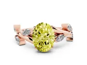 Fancy Yellow Oval Cut Diamond Solitaire Ring Set in Rose gold with Twisted Marquise Accent Band