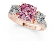 Fancy Pink Cushion Cut Diamond Three-Stone Ring Set in Rose gold with Pavé Band