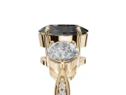 Fancy Black Oval Lab-Grown Diamond Three-Stone Ring Set in Yellow Gold with Channel-Set Band and Prong Setting