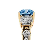 Fancy Blue Cushion Cut Diamond Three-Stone Ring Set in Yellow gold with Pavé Band