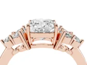 Cushion Cut Diamond Solitaire Ring Set in Rose gold with Cluster Accents on Each Side