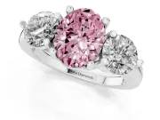Fancy Pink Oval Cut Diamond Three-Stone Ring Set in White gold with Prong Setting and Classic Band