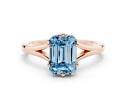 Fancy Blue Emerald Cut Diamond Solitaire Ring Set in Rose gold with Polished Tapered Band and Prong Setting