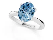 Fancy Blue Oval Cut Diamond Solitaire Engagement Ring Set in Platinum with Slim Tapered Solitaire Band
