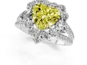 Fancy Yellow Heart Cut Diamond Halo Split Shank Engagement Ring Set in Platinum with Prong-Held Center Stone