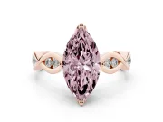 Fancy Pink Marquise Cut Diamond Twist Band Solitaire Ring Set in Rose gold with Leaf Prong Setting and Accent Stones