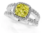 Fancy Yellow Cushion Cut Diamond Halo Ring Set in White gold with Pavé Split Shank and Prong Setting