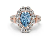 Fancy Blue Pear Cut Diamond Halo Engagement Ring Set in Rose gold with Split Shank and Prong Setting