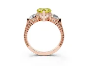 Fancy Yellow Heart Cut Diamond Three-Stone Ring Set in Rose gold with Milgrain Band