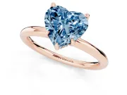 Fancy Blue Heart Cut Diamond Solitaire Ring Set in Rose gold with Thin Band and Prong Setting