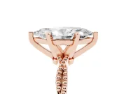 Marquise Cut Diamond Solitaire Ring Set in Rose gold with Twisted Band and Bead Prong Setting