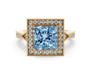 Fancy Blue Princess Cut Diamond Halo Engagement Ring Set in Yellow gold with Milgrain Pavé Band