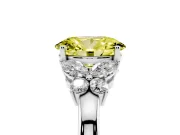 Fancy Yellow Oval Cut Diamond Solitaire Floral Ring Set in Platinum with Marquise Petals and Prong Setting