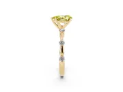 Fancy Yellow Pear Cut Diamond Solitaire Ring Set in Yellow gold with Bezel Set Side Stones and Prong Setting