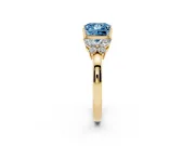 Fancy Blue Princess Cut Diamond Solitaire Floral Ring Set in Yellow gold with Marquise Petals and Prong Setting