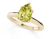 Fancy Yellow Pear Cut Diamond Solitaire Ring Set in Yellow gold with Cathedral Band and Prong Setting