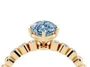 Fancy Blue Marquise Cut Diamond Solitaire Engagement Ring Set in Yellow gold with Bezel Accents on Beaded Band