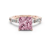 Fancy Pink Princess Cut Diamond Solitaire Set in Rose gold with Side Baguettes and Channel Set Band