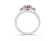 Fancy Pink Round Cut Diamond Three-Stone Ring Set in White gold with Pavé Band and Graduated Sides