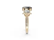 Fancy Black Oval Lab-Grown Diamond Three-Stone Ring Set in Yellow Gold with Channel-Set Band and Prong Setting