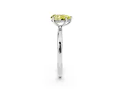 Fancy Yellow Pear Cut Diamond Solitaire Ring Set in Platinum with Thin Band and Prong Setting