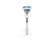 Fancy Blue Bezel Set Radiant Cut Diamond Solitaire Ring Set in White gold with Tapered Band