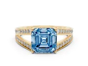 Fancy Blue Asscher Cut Diamond Split Shank Ring Set in Yellow gold with Pavé Band and Prong Setting