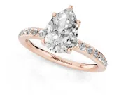 Pear Cut Diamond Pavé Band Ring Set in Rose gold with Prong-Set Center Stone