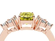 Fancy Yellow Emerald Cut Diamond Solitaire Ring Set in Rose gold with Cluster Accents on Each Side