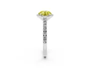 Fancy Yellow Round Cut Diamond Halo Engagement Ring Set in White gold with Pavé Band and Prong Setting