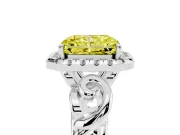 Fancy Yellow Radiant Cut Diamond Halo Ring Set in Platinum with Scrollwork Band and Prong Setting