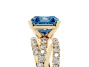 Fancy Blue Asscher Cut Diamond Solitaire Twist Band Ring Set in Yellow gold with Pavé Setting and Prong Head