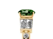 Fancy Green Round Cut Diamond Engagement Ring Set in Yellow gold with Baguette Side Stones and Channel Set Band