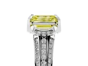 Fancy Yellow Emerald Cut Diamond Pavé Split Shank Solitaire Ring Set in White gold with Prong Setting